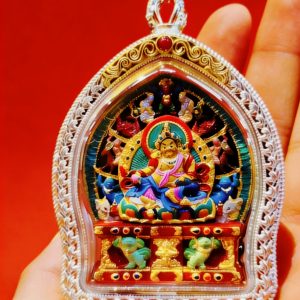 yellow jambhala gau box pendant, handcrafted sacred amulet